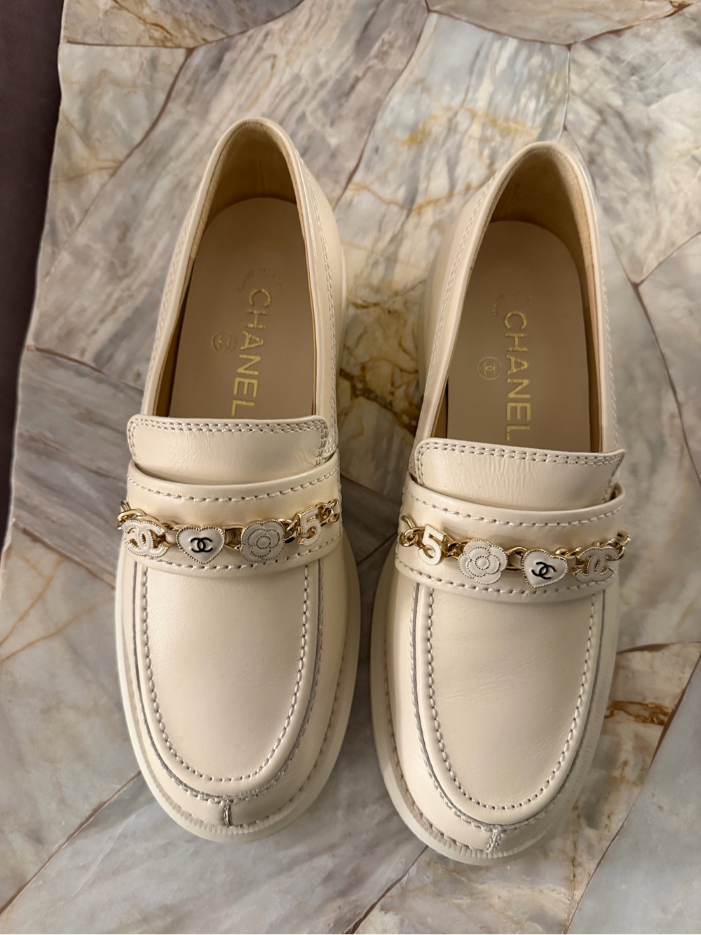CHANEL Cream Leather Chain-Detail Loafers
